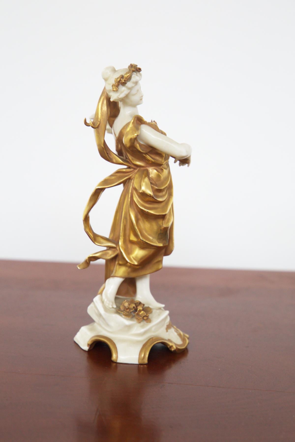 Cute ceramic figurine, part of the 'Signs of the Zodiac' collection, made in the early 20th century from Capodimonte ceramic painted in gold.
Capodimonte is a type of Italian porcelain first developed in the 18th century. It is known for its bright
