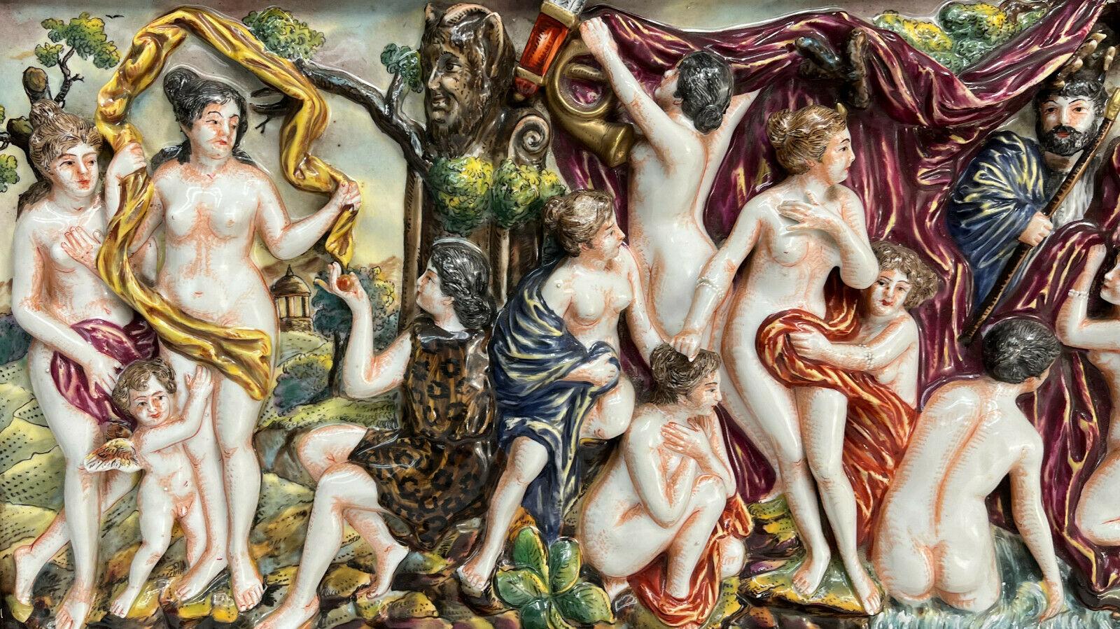 Capodimonte porcelain high relief plaque after Peter Paul Rubens, 1st Half 20th Century. After 17th Century Flemish Baroque painter, Peter Paul Rubens' Diana and Her Nymphs Surprised by Satyrs. Unmarked, but work of Capodimonte.

Additional