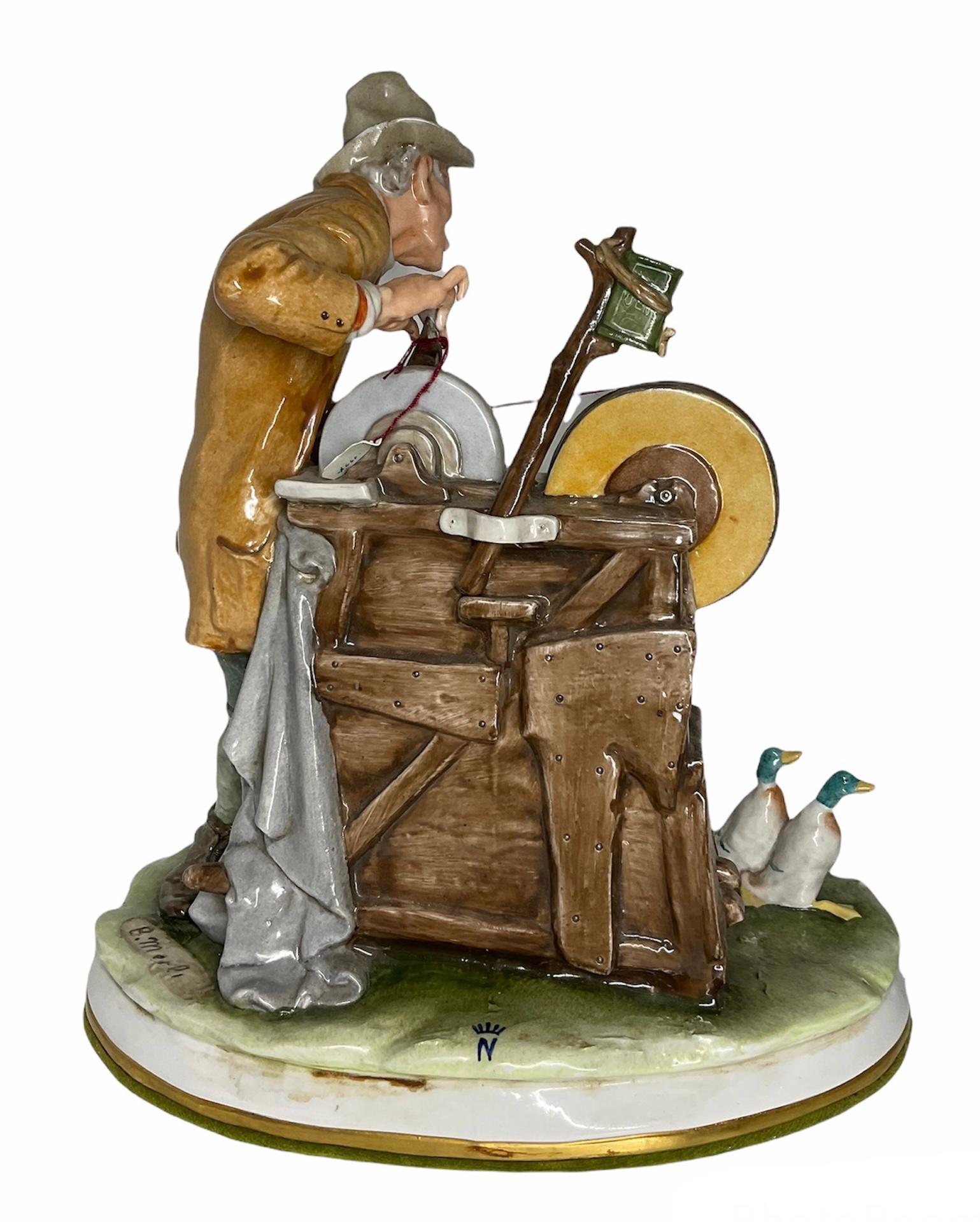 Hand-Painted Capodimonte Porcelain Sculpture of a Knife Sharpener