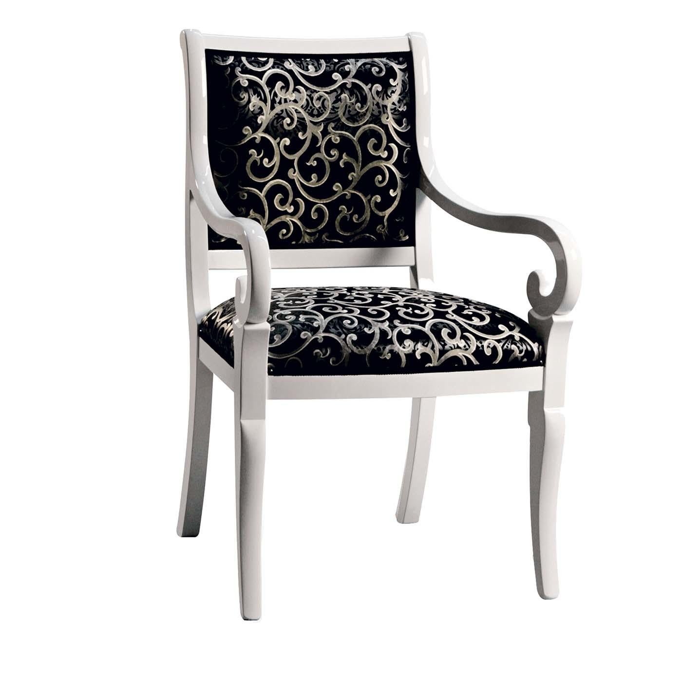 Showcasing the expertise of its craftsmen, Modenese Gastone created a superb chair with armrests of regal and delicate visual harmony. The solid wood frame bends in delicate saber legs and curved armrests, enclosing the padded seat and backrest. The