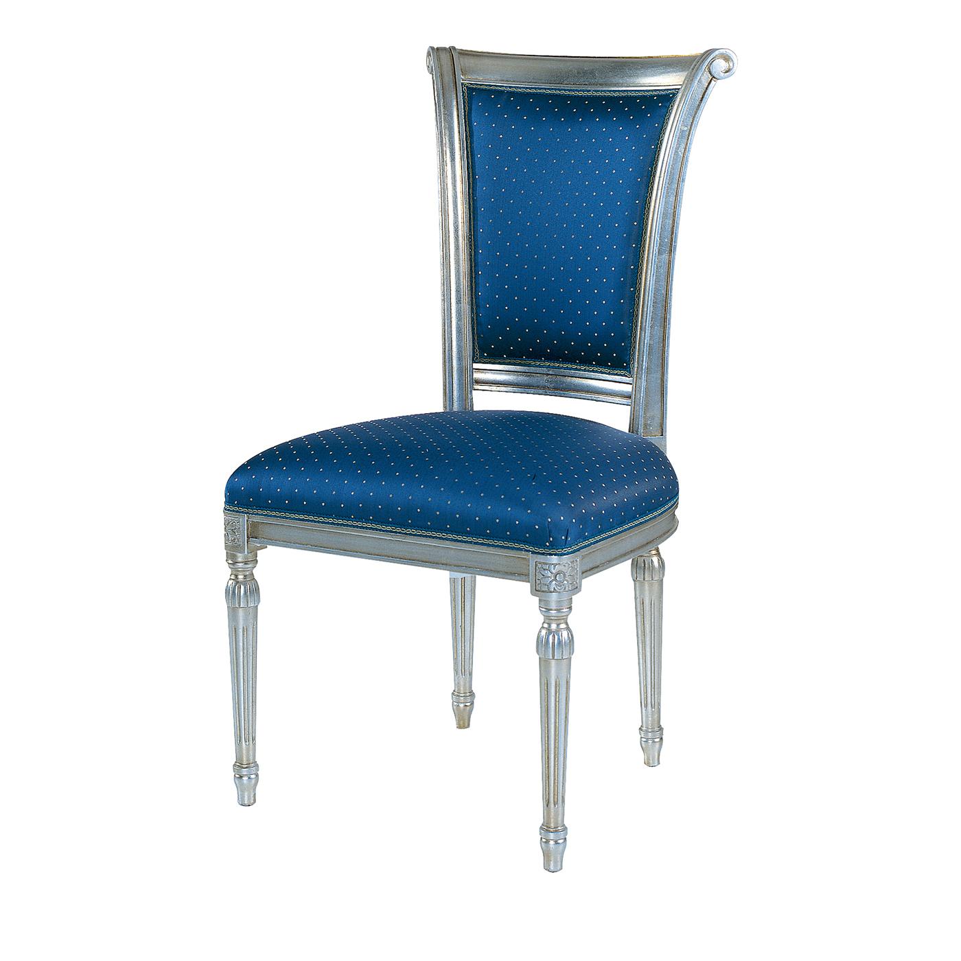 An elegant chair with a Classic and original design. This chair, part of the Contemporary collection, has a wooden frame with silver finish, which perfectly combines with the upholstery of the seat and back. in a small polka dots blue material . A