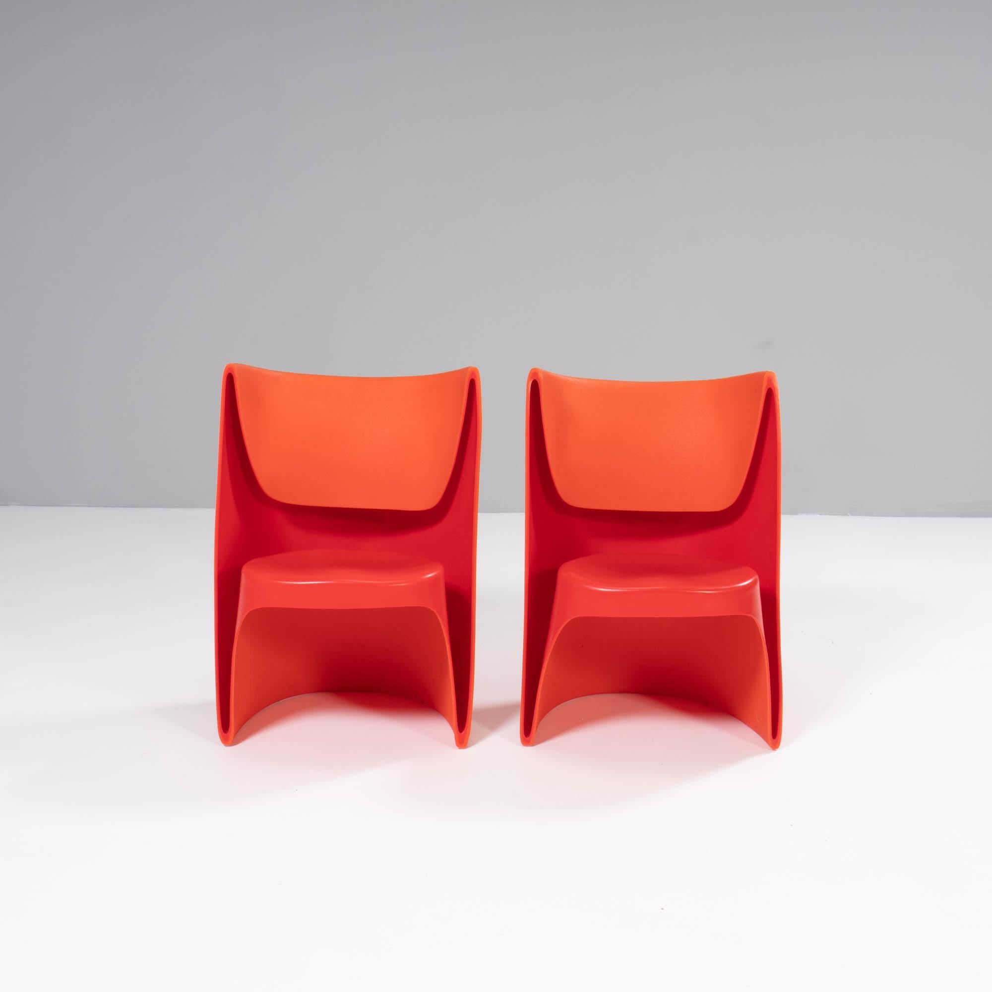 Designed by Ron Arad for Cappellini in 2002, the ‘Nona Rota’ chair is the taller version of the ‘Nino Rota’ 

Constructed from twin walled moulded orange plastic, the chairs have a rounded silhouette with a textured outer shell and smooth interior