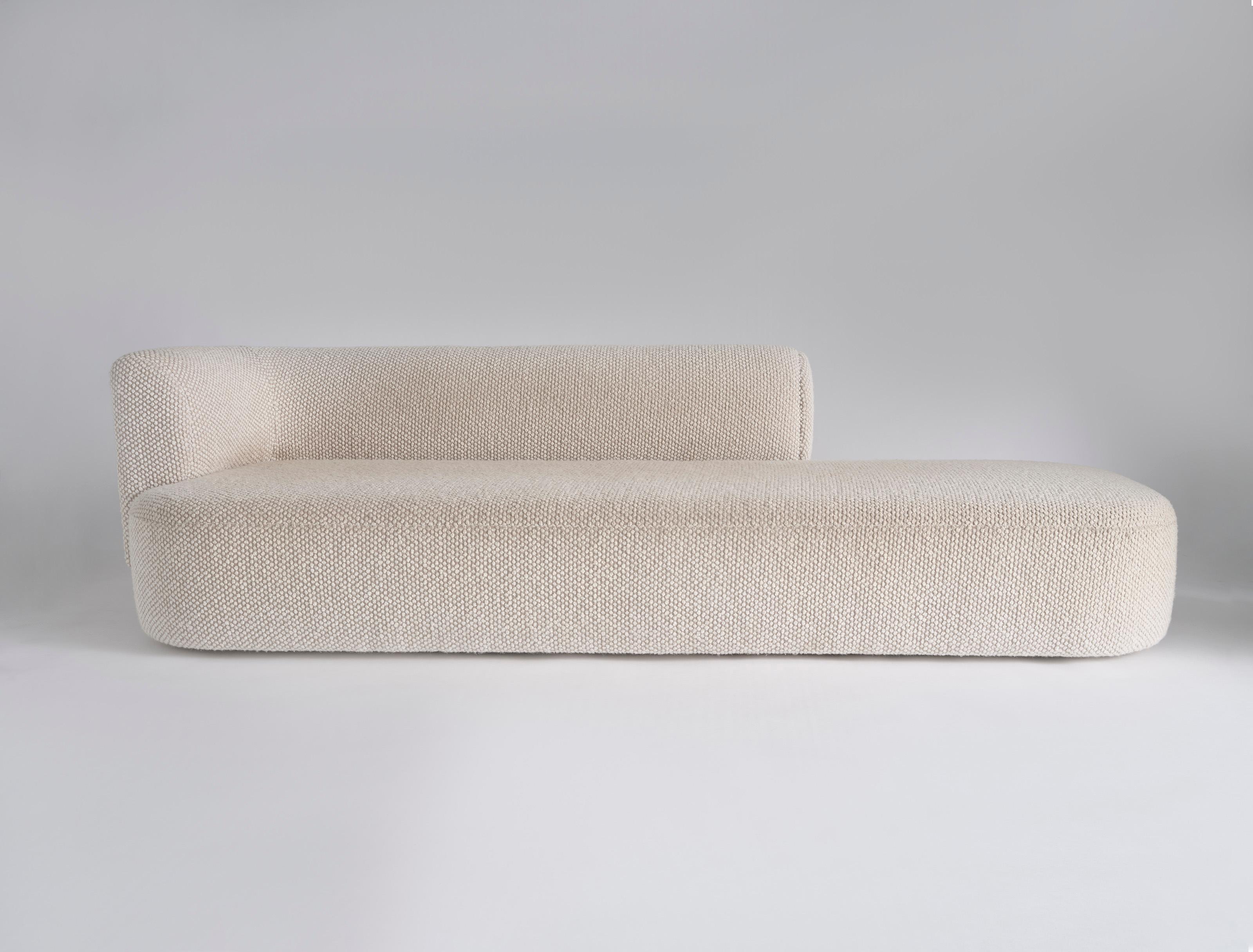 Listed price is for the capper sofa and comfort zone by HBF fabric. 
COM is also available, with a List price of $ 6,670.00.

Prices exclude packing. 

Inspired by the warmth of a hug, Capper’s design and construction envelopes you in coziness, for