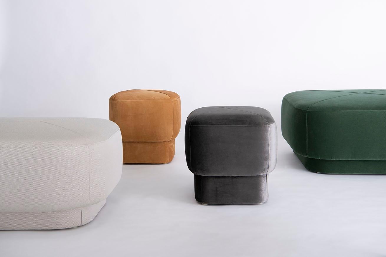 Listed price is for the Capper low stool and comfort zone by HBF fabric. 
COM is also available, with a List price of $ 1,090.00.
The Capper Low Stool is also available in leather, with a List price of $ 1,831.00 in Cottswald by Moore & Giles