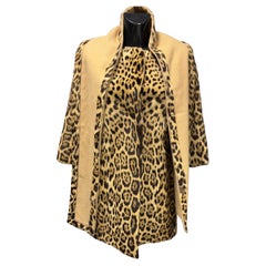 Cappotto in giaguaro pari al nuovo con sciarpa