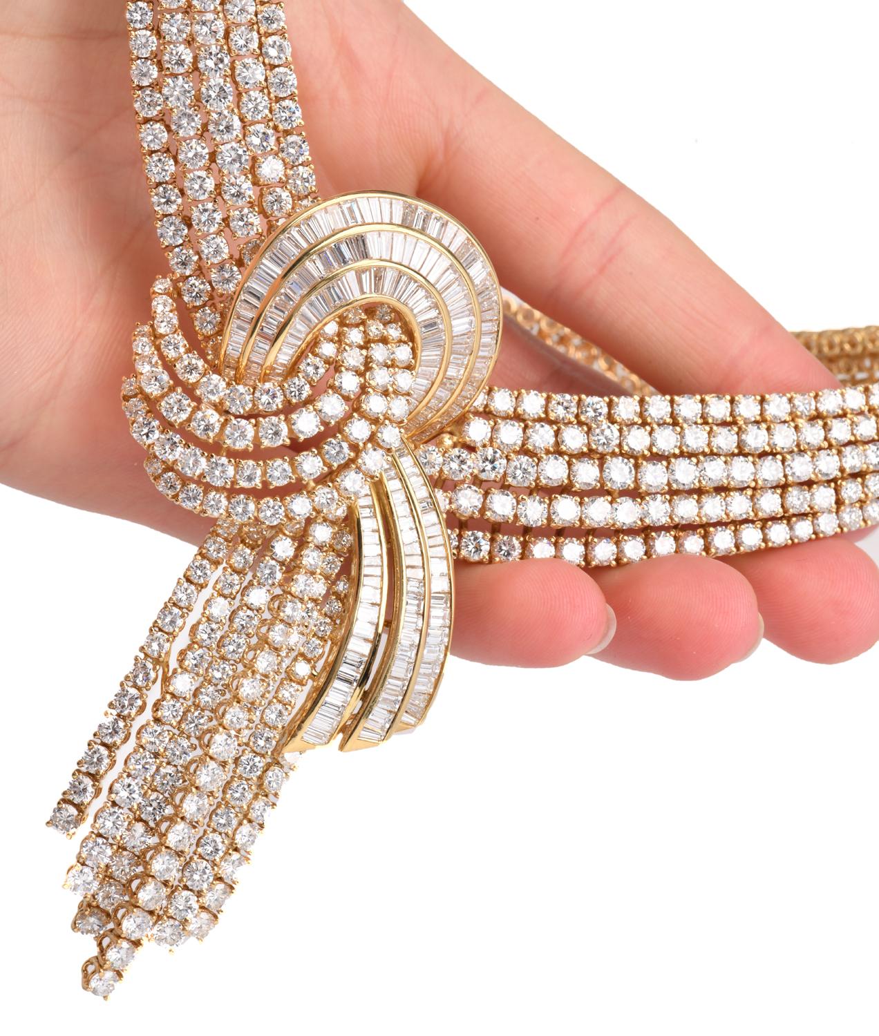 Stunning CAPRI Scarf Knot Design Statement Necklace made in solid 18K Yellow gold adorned with Prong set natural diamonds.
There are over 837 natural diamonds in Round and Baguette cuts. The total estimated carat weight is 122.58 carats total. The