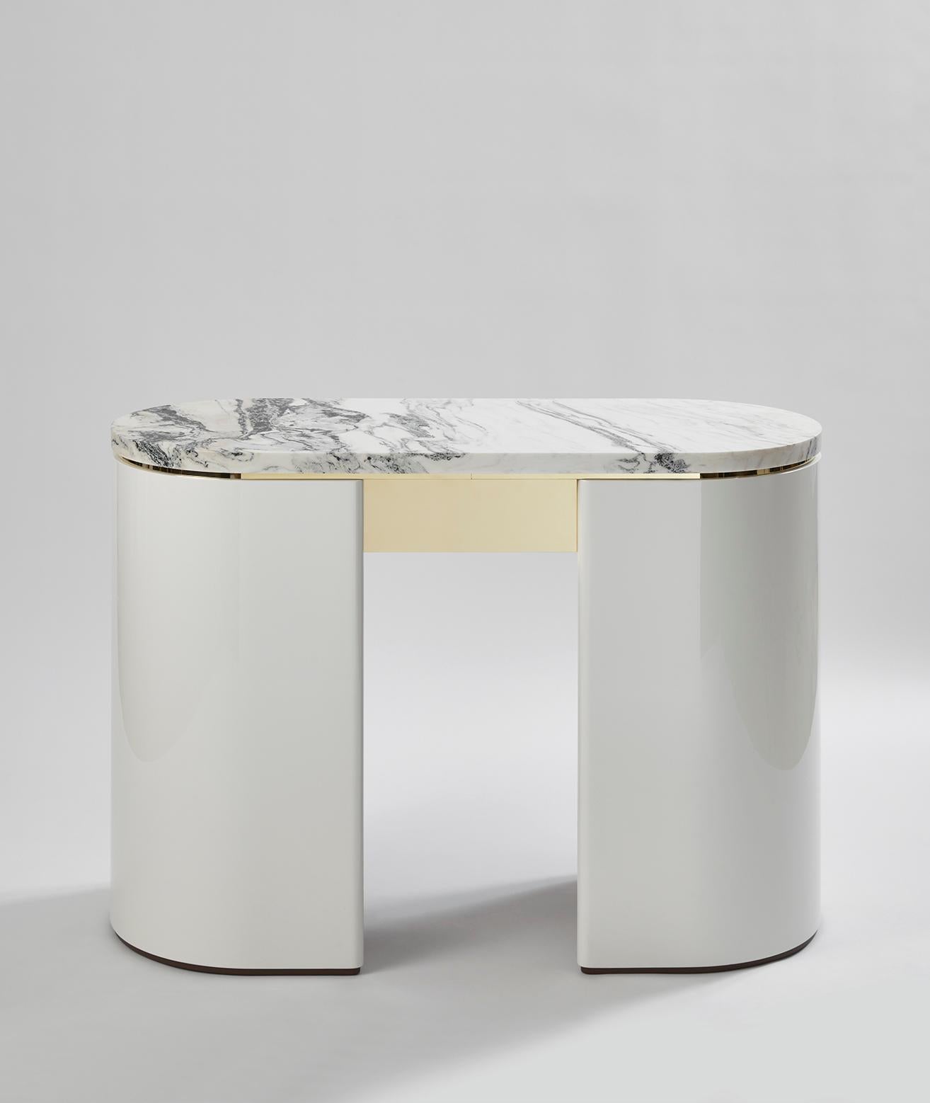 Capri, Console desk, designed by Hervé Langlais for the Gallery Negropontes

H 29.7 x W 41.3 x D, 17.7 inch
Marble and lacquered wood with brass details

Hervé Langlais is a graduate of the Normandy School of Architecture in Rouen. He collaborated