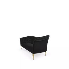 Divano con base in metallo Caprichosa