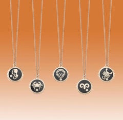 Capricorn Necklace with Black Enamel and 0.01ct White Diamond by Selda Jewellery