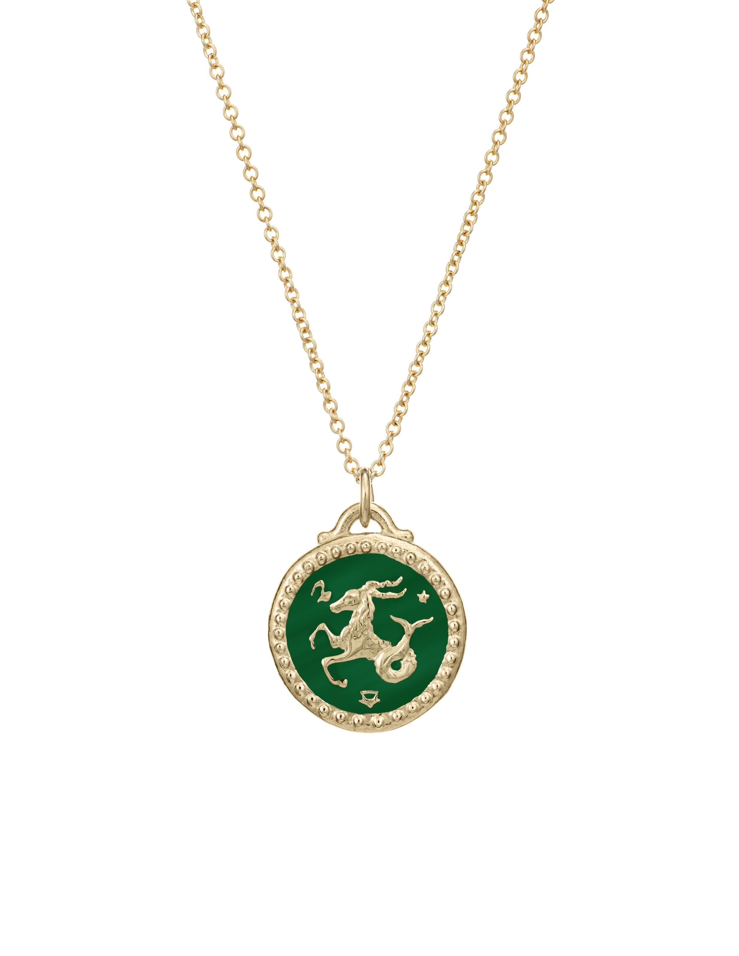 Part of our new Zodiac collection. The Capricorn Pendant features the sea-goat on one side and the Capricorn symbol on the other. Designs are meticulously hand-carved into 14k gold and finished with enamel. This pendant is customizable and available