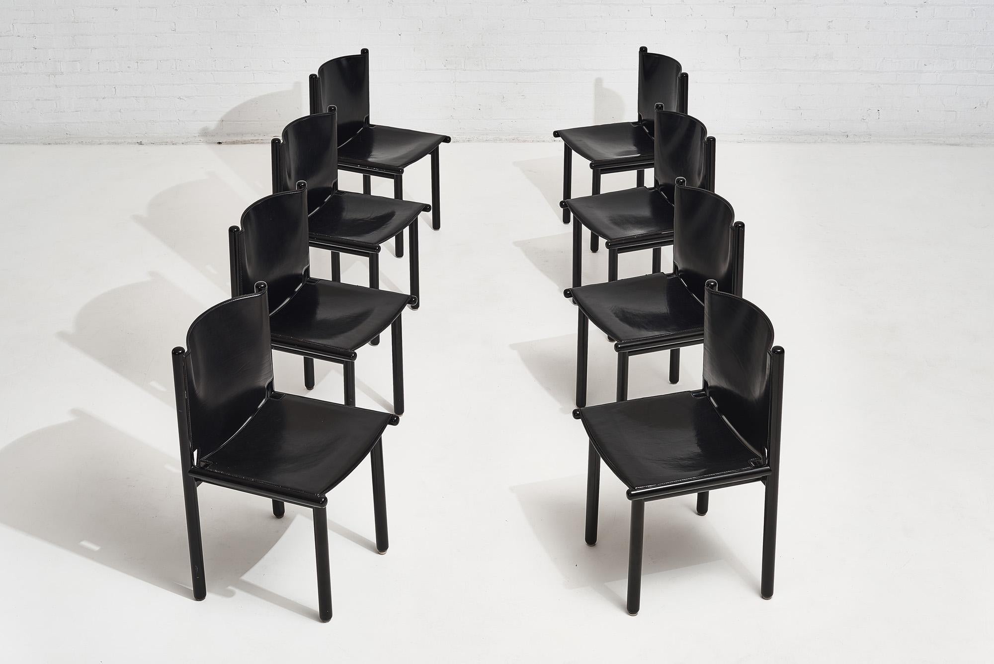 Caprile dining chairs by Gianfranco Frattini for Cassina, 1980’s. Set of 8, made of steel and leather. Original condition.