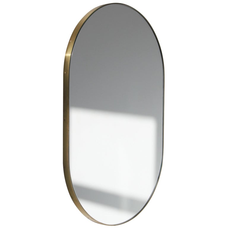 In Stock Capsula Pill Shaped Mirror with Demister Pad, Brass Frame, XL For Sale at 1stDibs