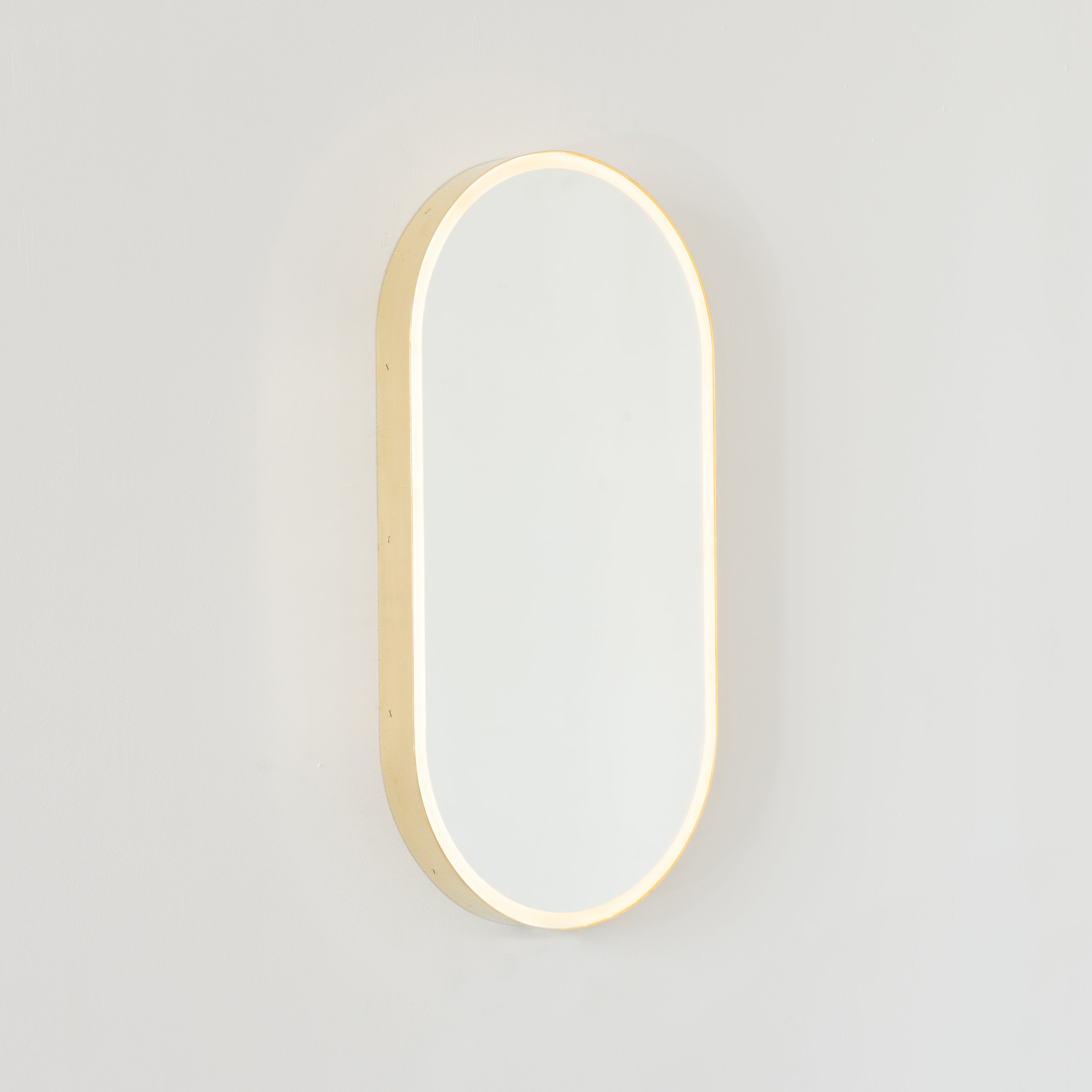 British Capsula Illuminated Capsule Shape Modern Mirror with Brass Frame, Medium For Sale