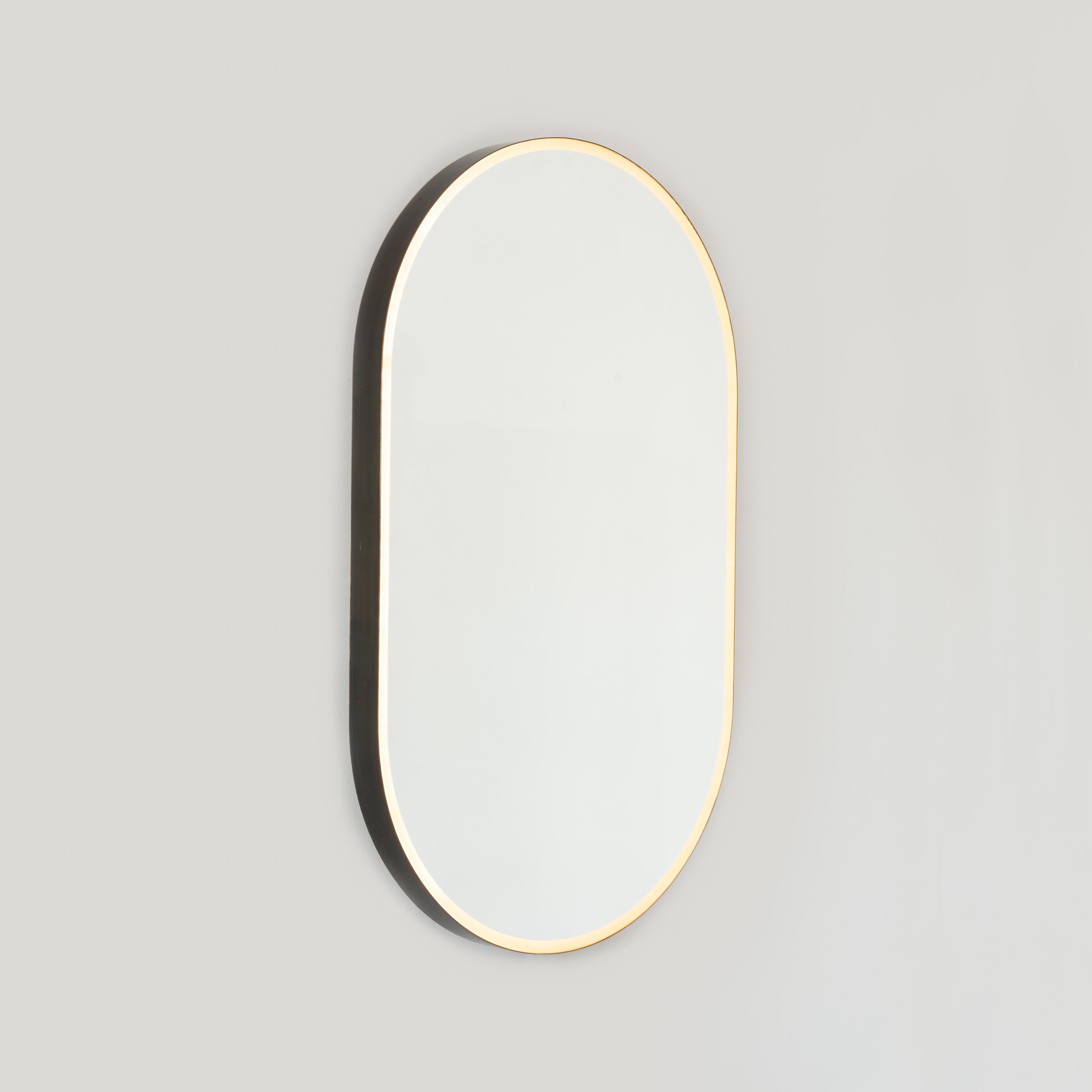 Capsula Illuminated Pill Shaped Mirror with Bronze Patina Frame, Medium For Sale 2