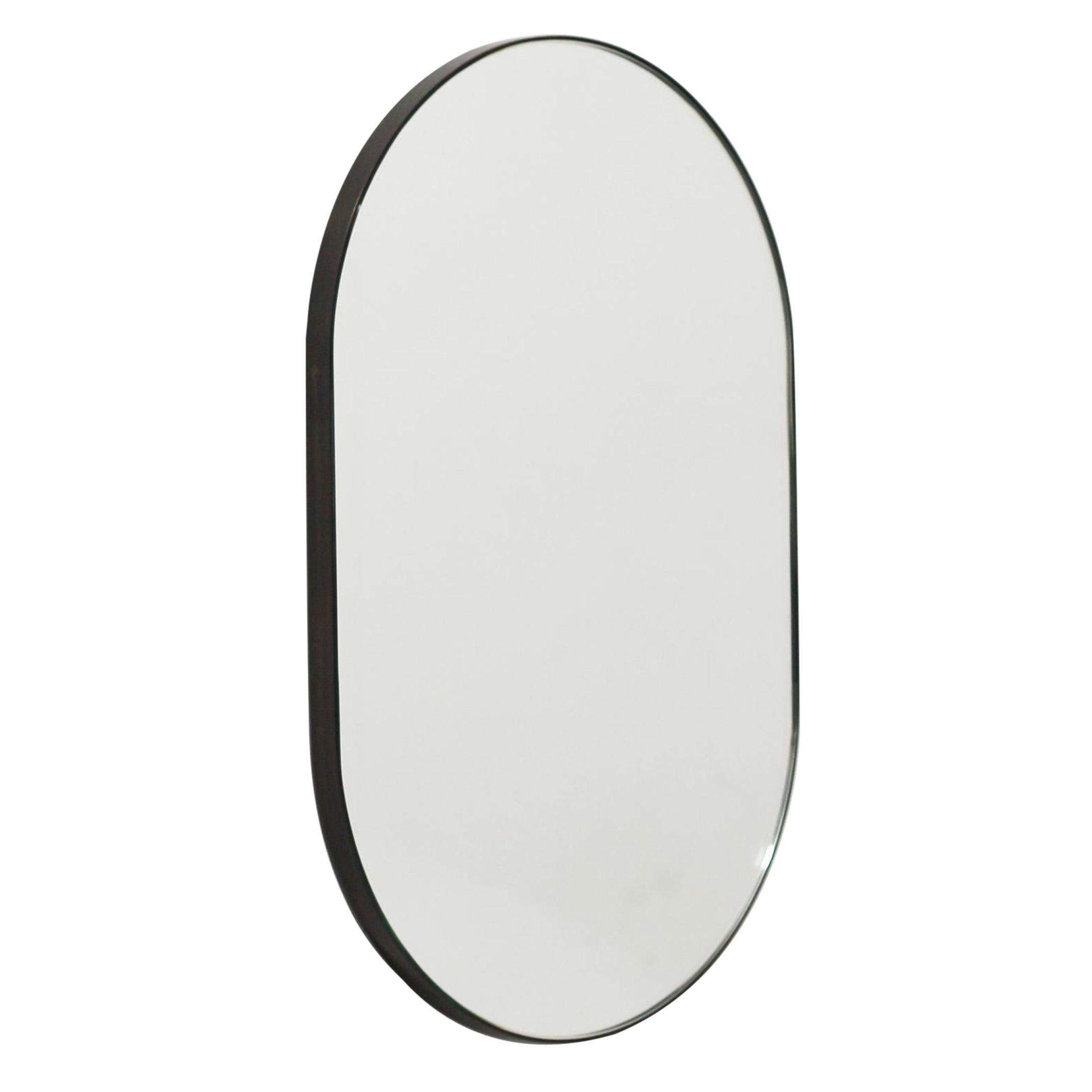 Capsula Pill shape Contemporary Mirror with Bronze Patina Frame, Small