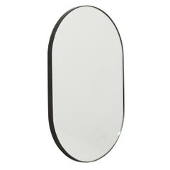 Capsula Pill shape Contemporary Mirror with Bronze Patina Frame, Small