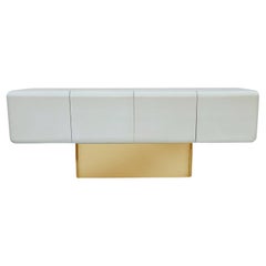 Capsule Form Mid-Century Modern off White Credenza or Sideboard on Brass Base 