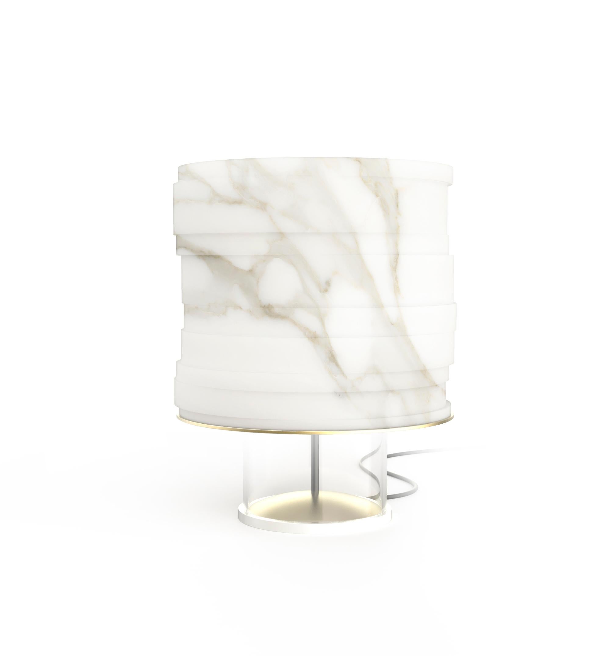 Capsule Module3 table lamp by Marmi Serafini
Materials: Calcatta Oro marble.
Dimensions: D 28 x H 36 cm
Available in other marbles.

This elegant table lamp is available in three different versions, distinguish by top marble part.
Once light