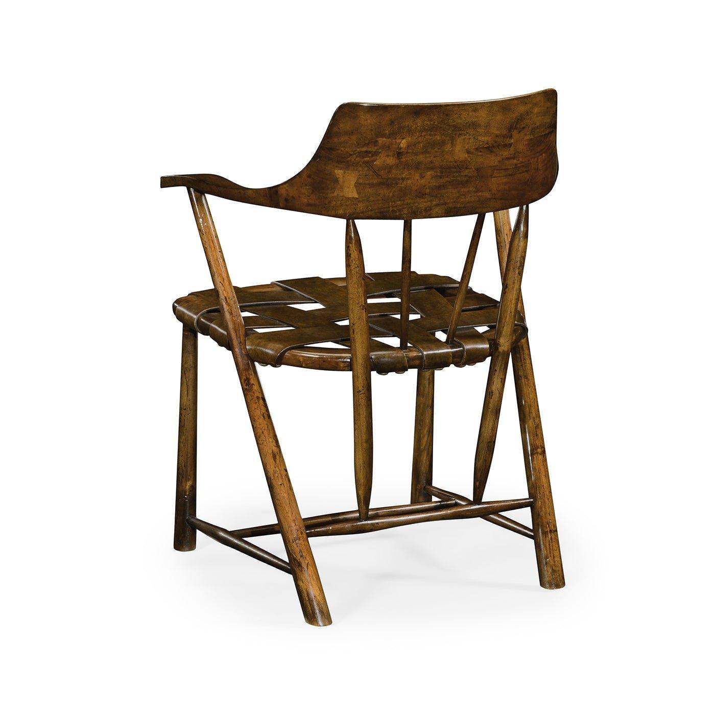Featuring a gracefully curved solid plank back with delicate spindle supports. The high arms provide a commanding presence, while seamlessly integrating with the back spindles for an effortlessly balanced aesthetic.

The seat, expertly crafted with