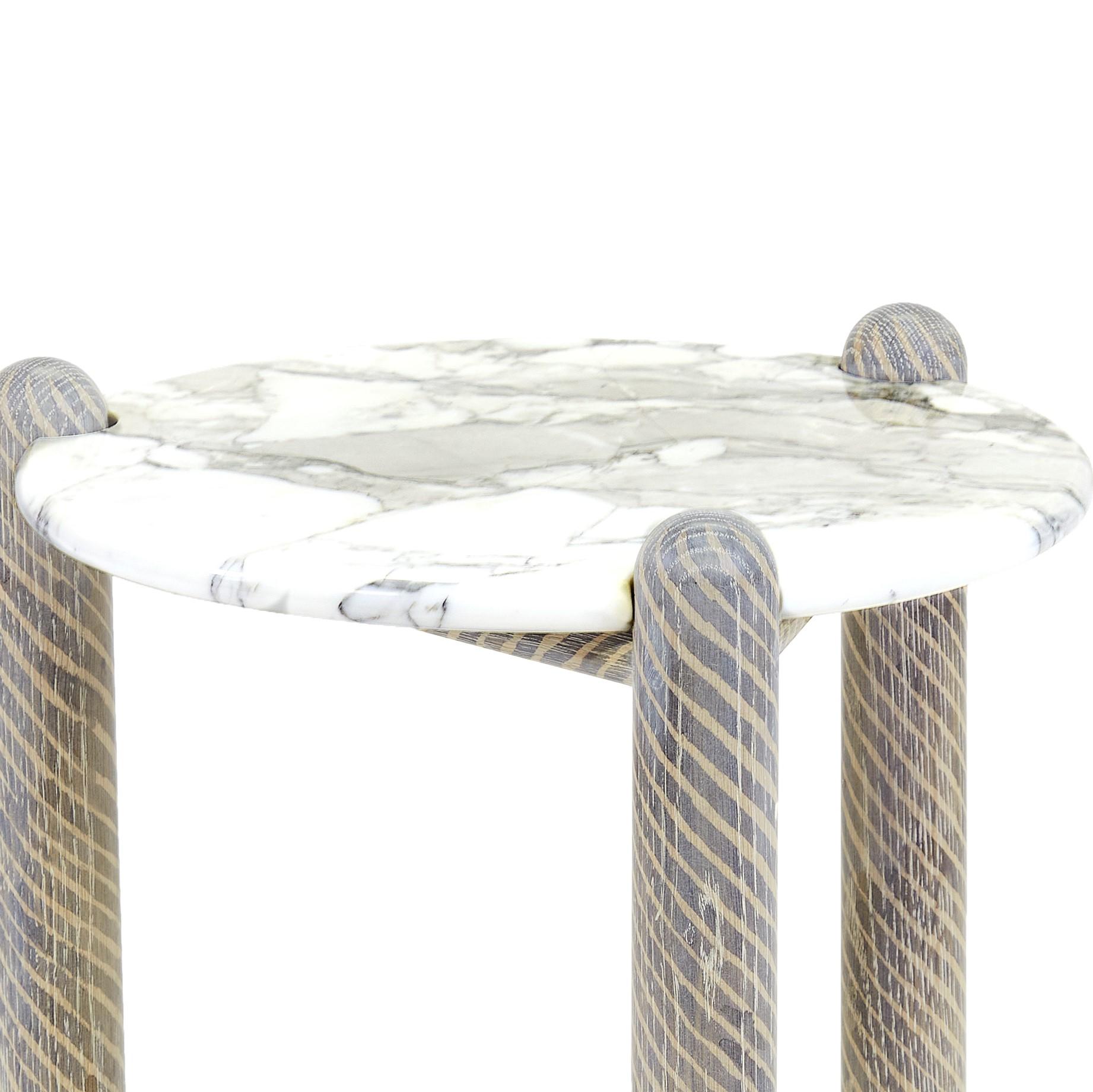 Captain's side table by Hamilton Holmes.
Oxalino Collection 
Dimensions: D 38.1, W 38.1, H 50.8 cm
Materials: White oak, Calcatta marble, natural Danish cord, oxidized treatment.

These solid oak three legged tables feature handwoven Danish