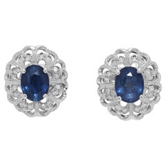 Accattivanti orecchini con zaffiro e diamante naturale da 0,48 carati in oro bianco 18 carati