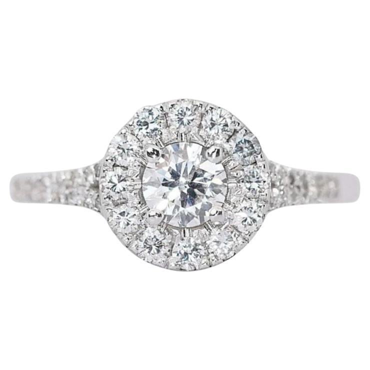 Captivating 0.50ct Round Brilliant Diamond Ring in 18K White Gold For Sale