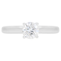 Captivant bague solitaire en or blanc 18 carats avec diamant 0,55 carat