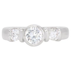 Captivant bague à 3 pierres de 0,60 carat sertie d'or blanc 18 carats