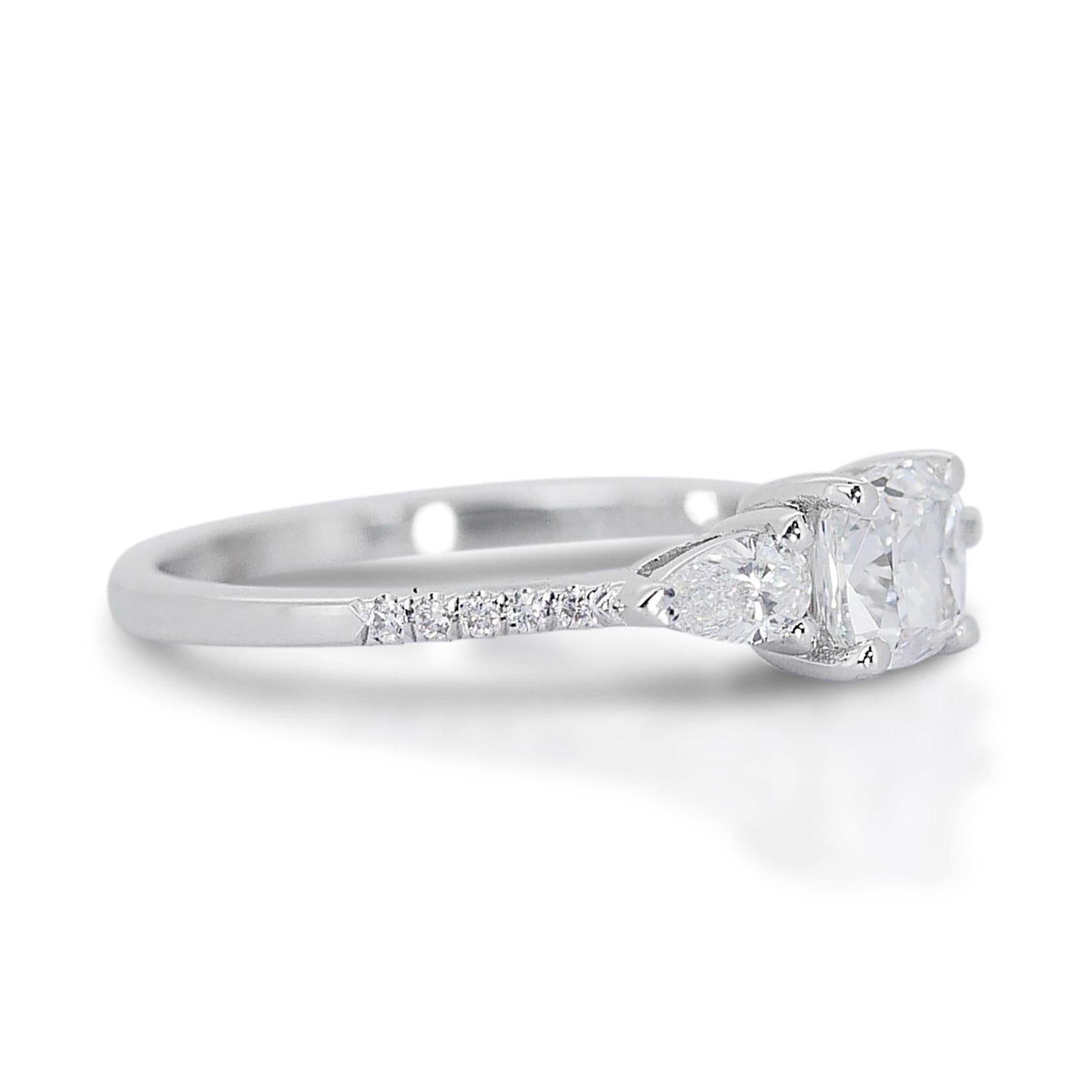 Captivating 0.78ct Diamond 3-Stone Ring in 18k White Gold - GIA Certified

Discover refined elegance with this 18k white gold diamond 3-stone ring, featuring a stunning 0.73-carat cushion-cut diamond as the centerpiece. Accompanying the main stone