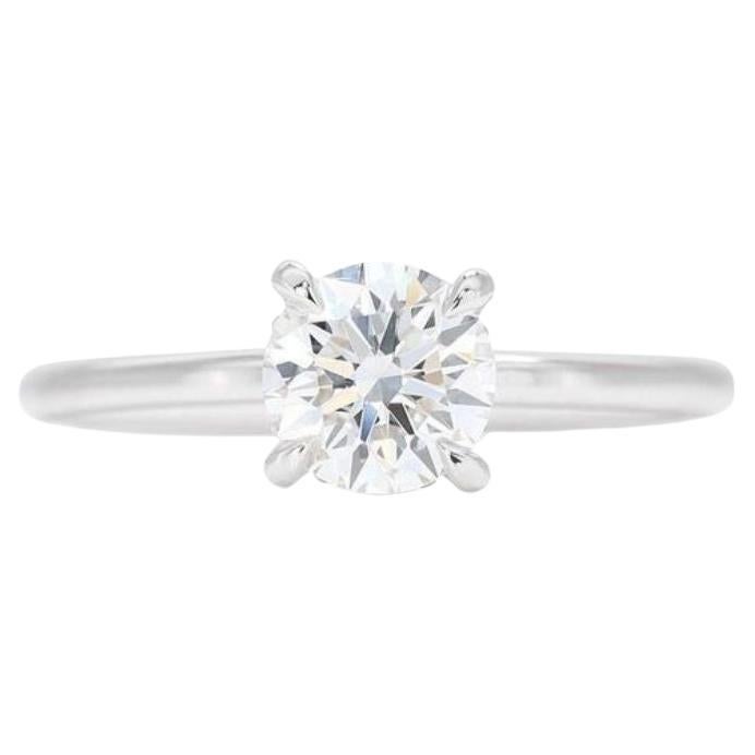 Captivating 0.75ct Solitaire Diamond Platinum Ring For Sale