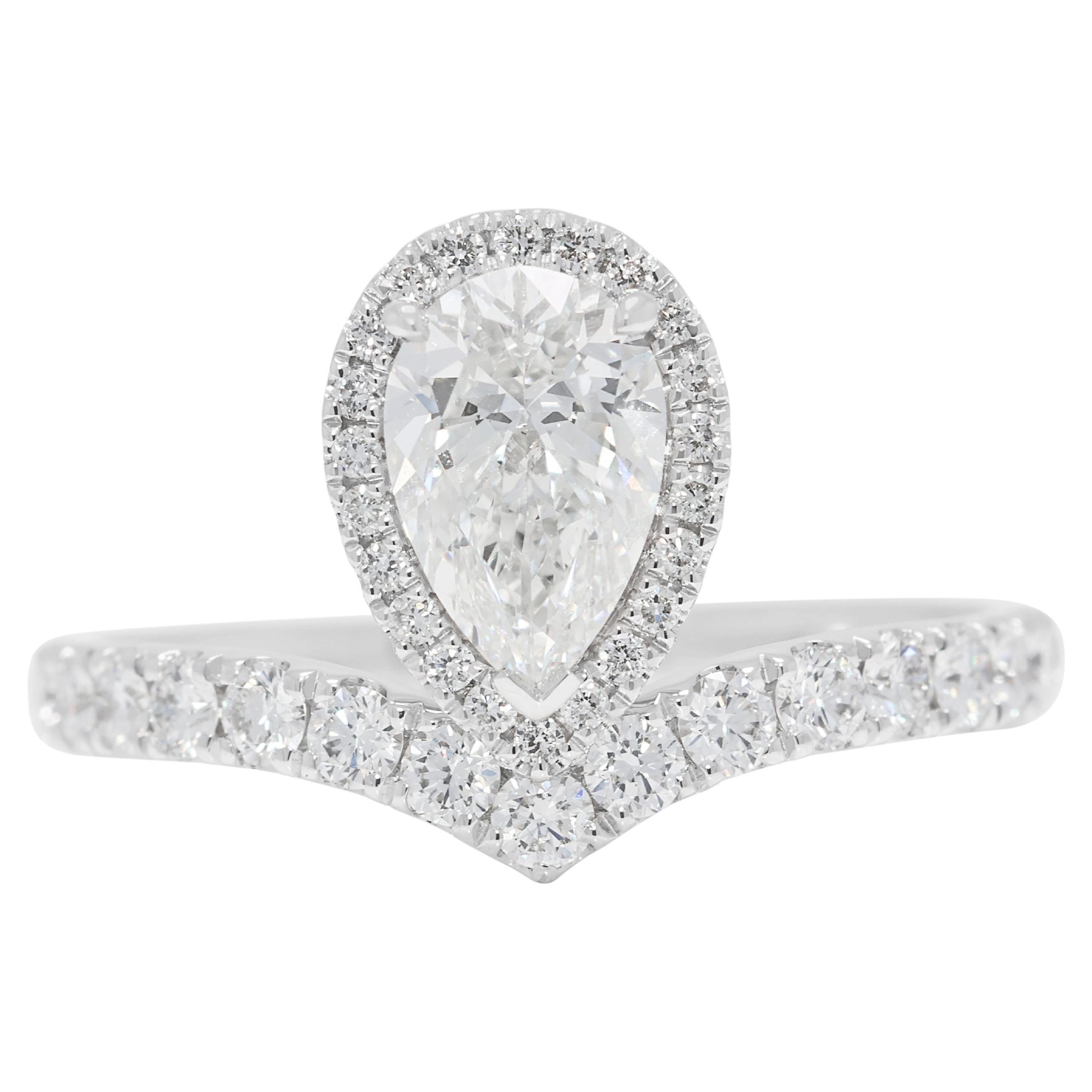 Captivating 1.24ct Natural Diamond Pear Halo Platinum Ring For Sale
