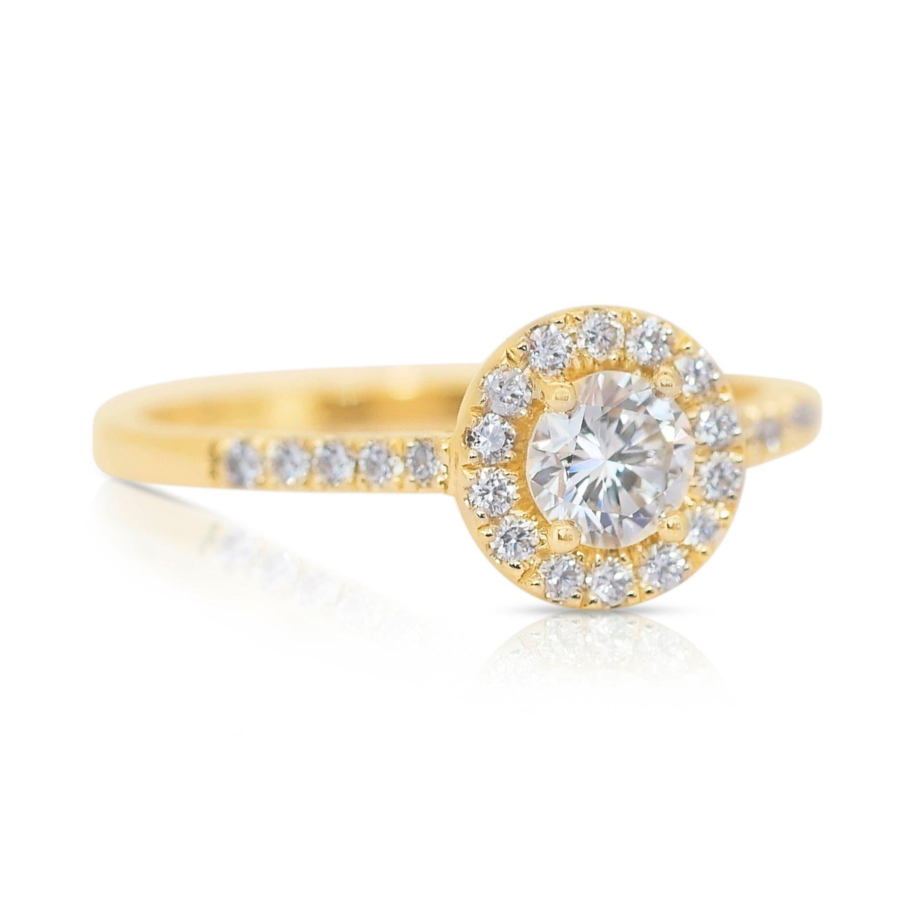 Captivating 1.32ct Triple Excellent Ideal Cut Diamonds Halo Ring in 14k Yellow Gold - IGI Certified

Elevate your style with this stunning 14k yellow gold halo ring, featuring a brilliant 1.07ct round diamond as its centerpiece. Boasting a triple