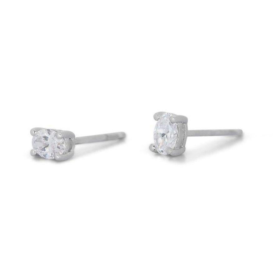 Oval Cut Captivating 1.40ct Oval Diamond Stud Earrings in 18K White Gold For Sale