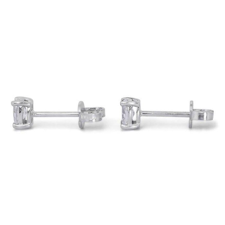 Captivating 1.40ct Oval Diamond Stud Earrings in 18K White Gold In New Condition For Sale In רמת גן, IL