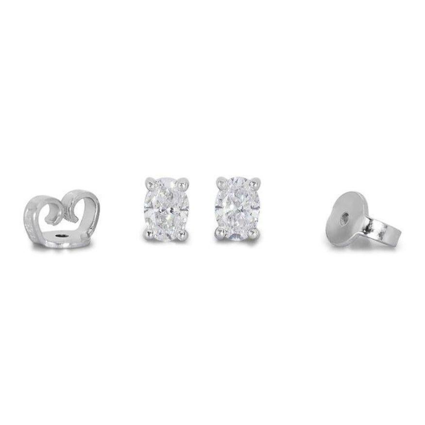 Captivating 1.40ct Oval Diamond Stud Earrings in 18K White Gold For Sale 1