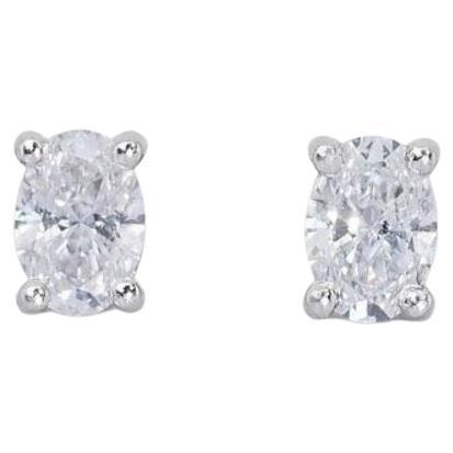 Captivating 1.40ct Oval Diamond Stud Earrings in 18K White Gold For Sale