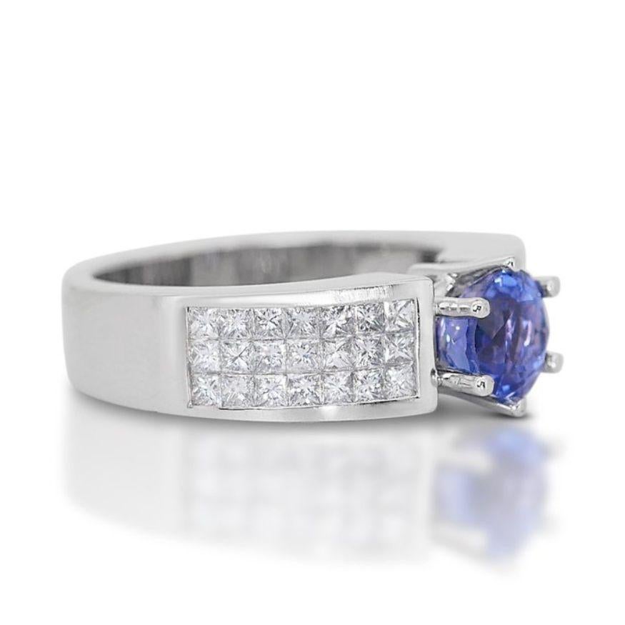 Round Cut Captivating 1.50 Carat Round Tanzanite Ring in 18K White Gold For Sale