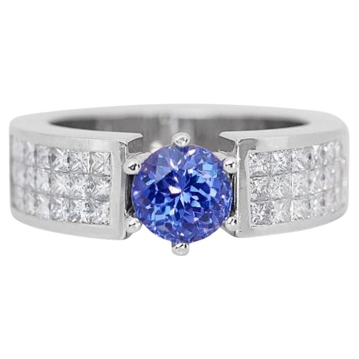 Captivating 1.50 Carat Round Tanzanite Ring in 18K White Gold For Sale
