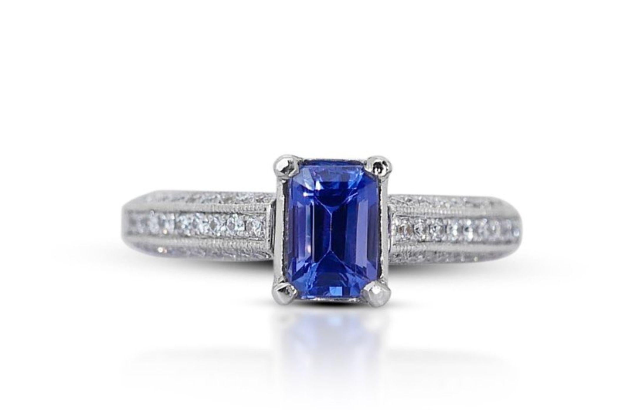Emerald Cut Captivating 1.82 total carat of Tanzanite and Natural Diamonds Ring For Sale