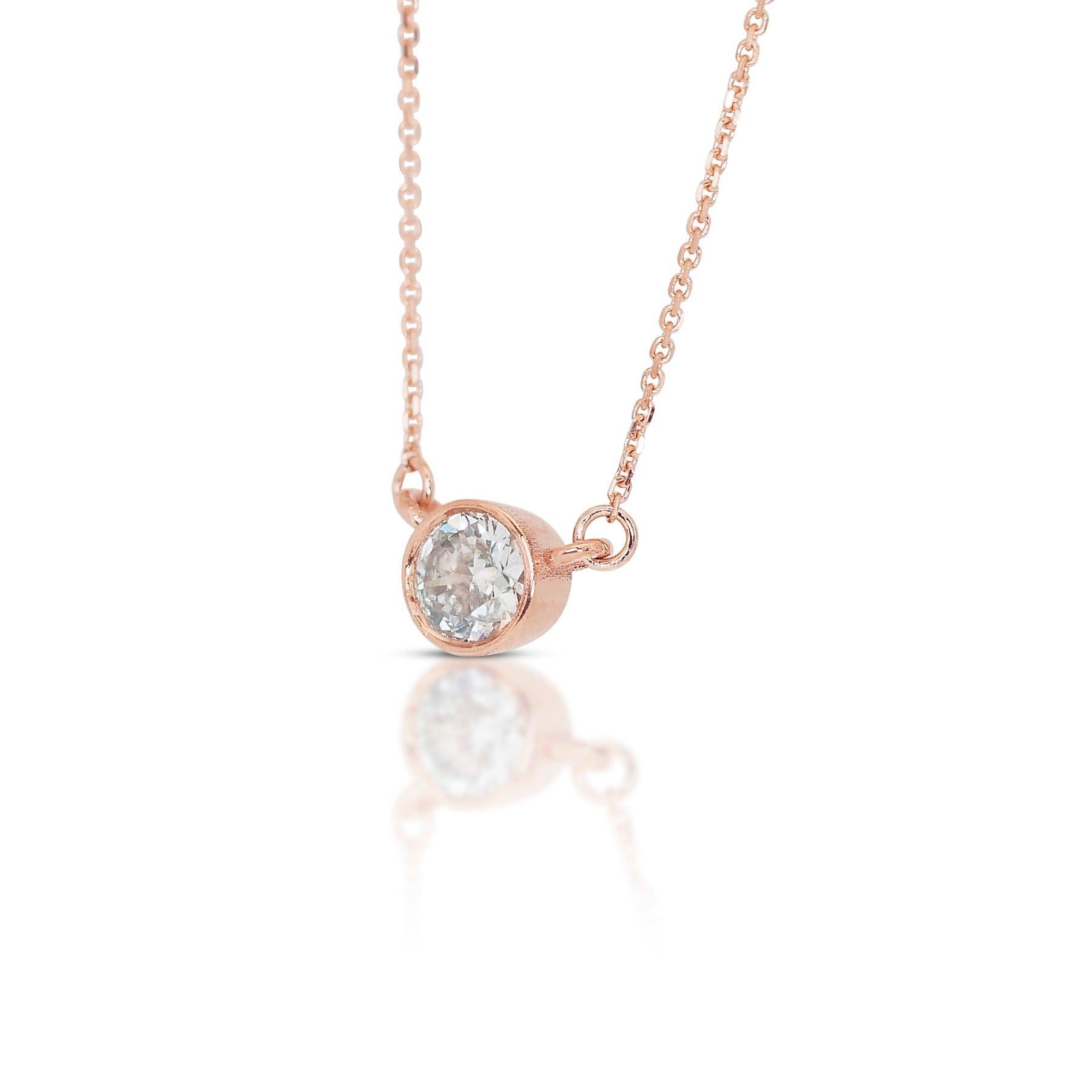 Captivating 18K Rose Gold Natural Diamond Necklace w/0.70ct 

This captivating necklace showcases a stunning 0.70 carat natural diamond. The delicate 18K rose gold chain, measuring 42 cm in length, complements the diamond perfectly, creating a piece