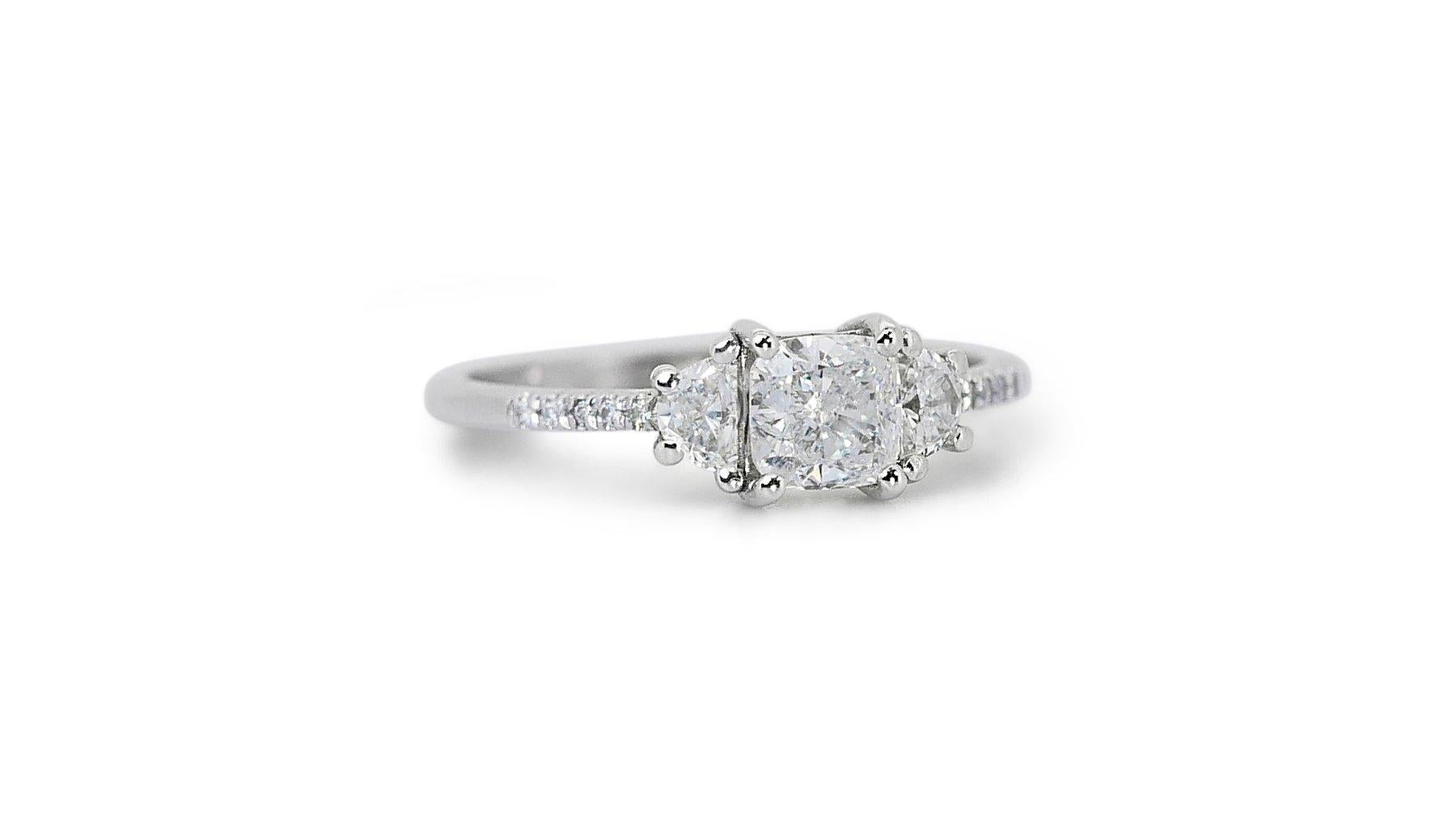 Captivating 18K White Gold Natural Diamond Halo Ring w/1.31 Carat

Presenting our captivating diamond halo ring featuring a stunning 1.01 carat center stone.  The center stone is beautifully complemented by a sparkling halo of two half moon diamonds