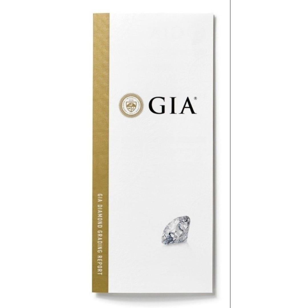 Captivant bague en or blanc 18 carats avec halo de diamants naturels de 1,31 carat, certifié GIA en vente 4