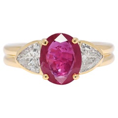 Captivating 2.18ct Ruby
Trillion Diamond Ring in 18K Yellow Gold