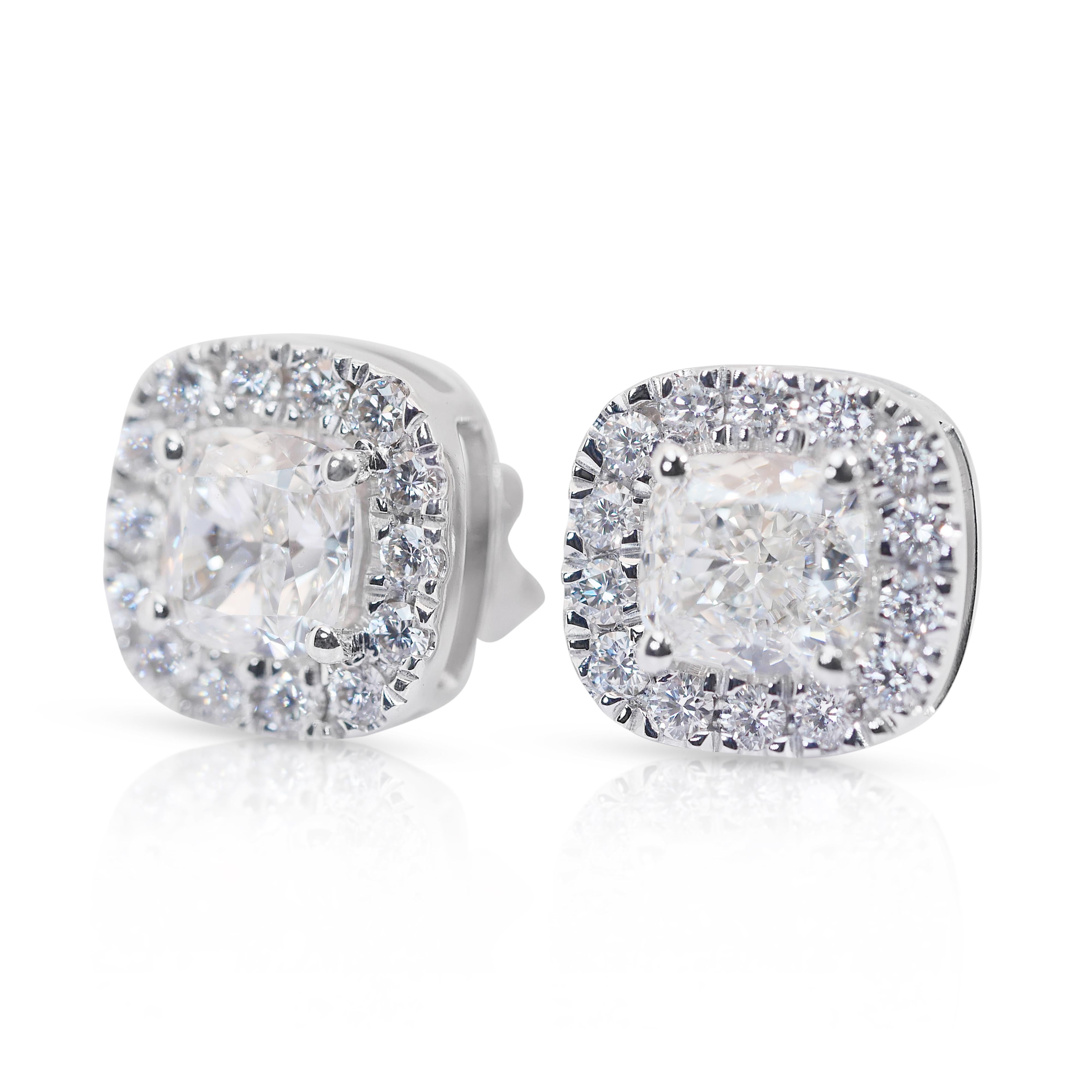 Captivating 2.52ct Diamonds Halo Stud Earrings in 18k White Gold - IGI Certified

Elevate your style with these stunning 18k white gold halo diamond stud earrings. Each earring showcases a magnificent cushion-cut diamond as the centerpiece, totaling