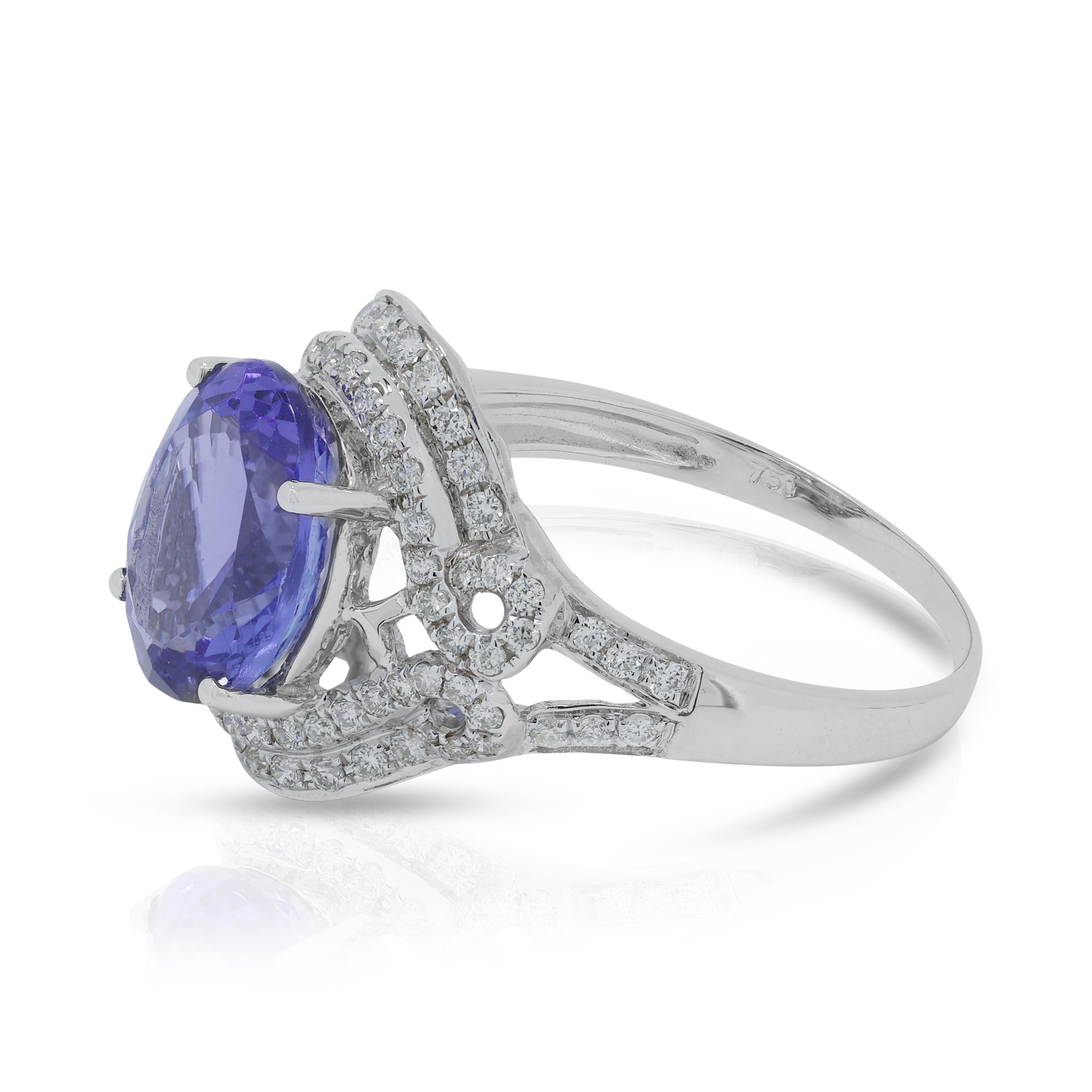 Oval Cut Captivating 3.373ct Tanzanite Ring with Natural Diamond in 18K White Gold For Sale