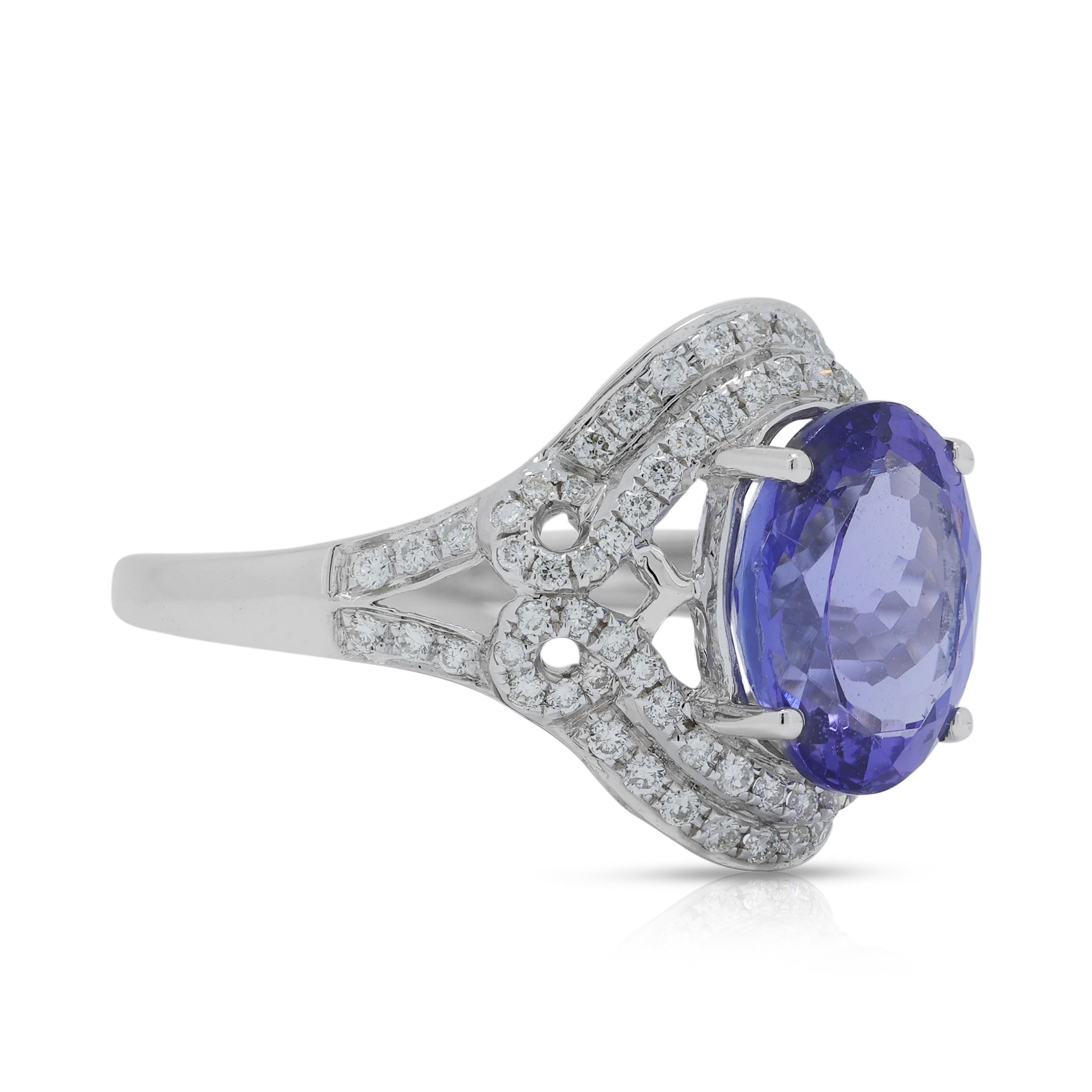 Captivating 3.373ct Tanzanite Ring with Natural Diamond in 18K White Gold In New Condition For Sale In רמת גן, IL