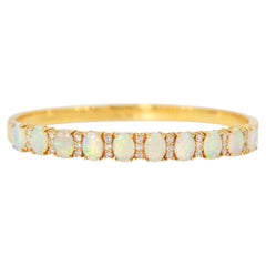 Accattivante braccialetto con opale da 4,13ct in oro giallo 18K