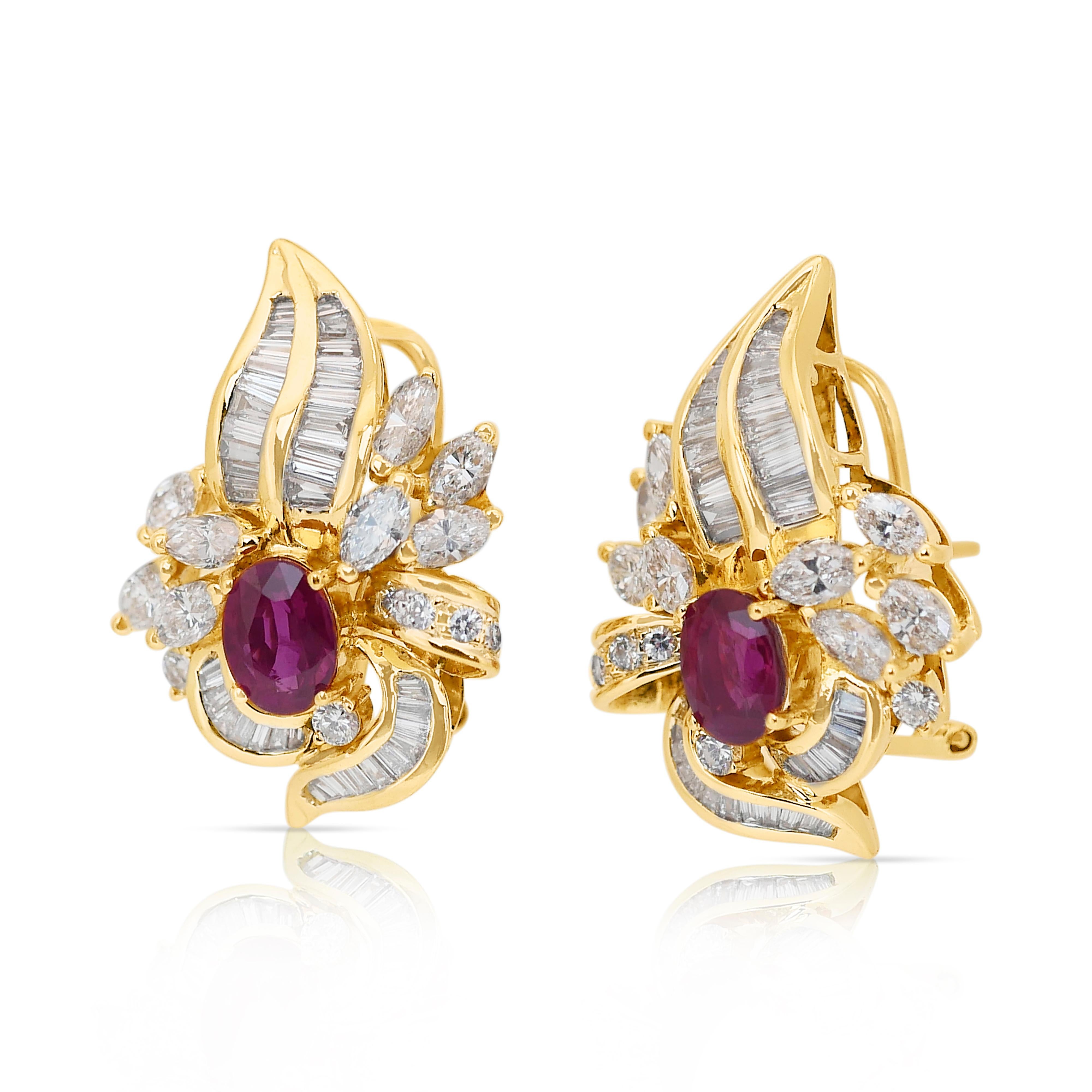 Captivating 6.12ct Rubies and Diamonds Earrings in 18k Yellow Gold - IGI Certified

A striking combination of stunning rubies and dazzling diamonds defines these luxurious 18k yellow gold drop earrings. Showcasing two oval rubies totaling 1.63ct in