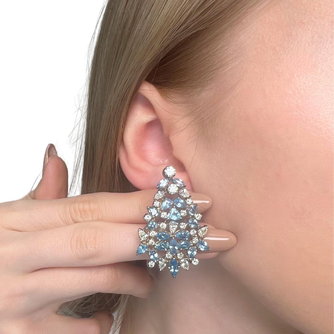 Accattivanti orecchini a goccia con topazio e diamanti da 9,40 carati in oro bianco 18 carati - certificati IGI

Questi straordinari orecchini in oro bianco 18 carati celebrano davvero il colore e la brillantezza. Irradia un'eleganza vibrante, con