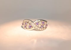 Captivating Alexandrite & Diamond Infinity Ring in Platinum